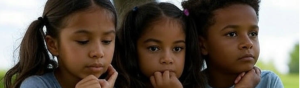 AI - three children, two girls and a boy are in deep thought, sitting closely together.